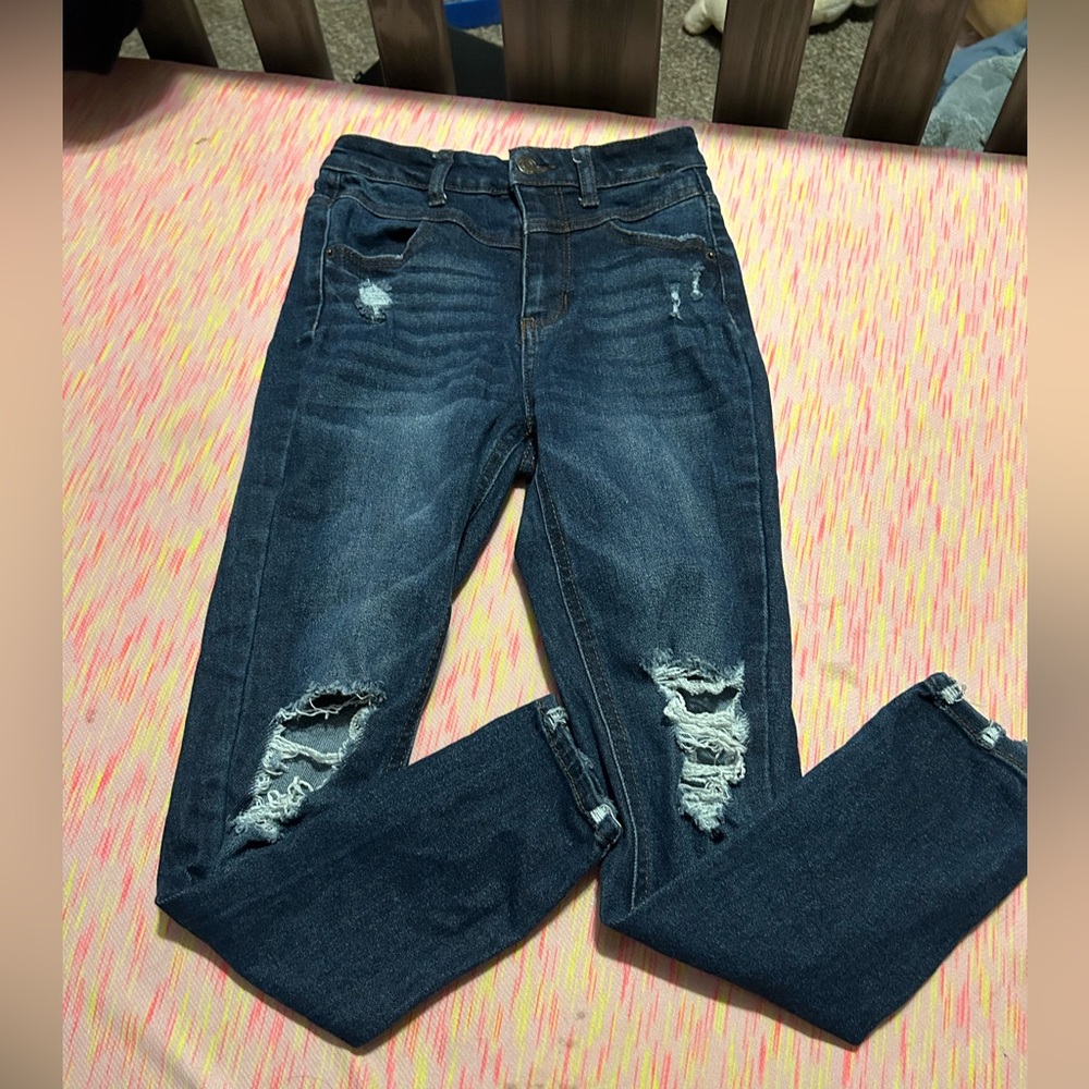 Ripped Blue Jeans